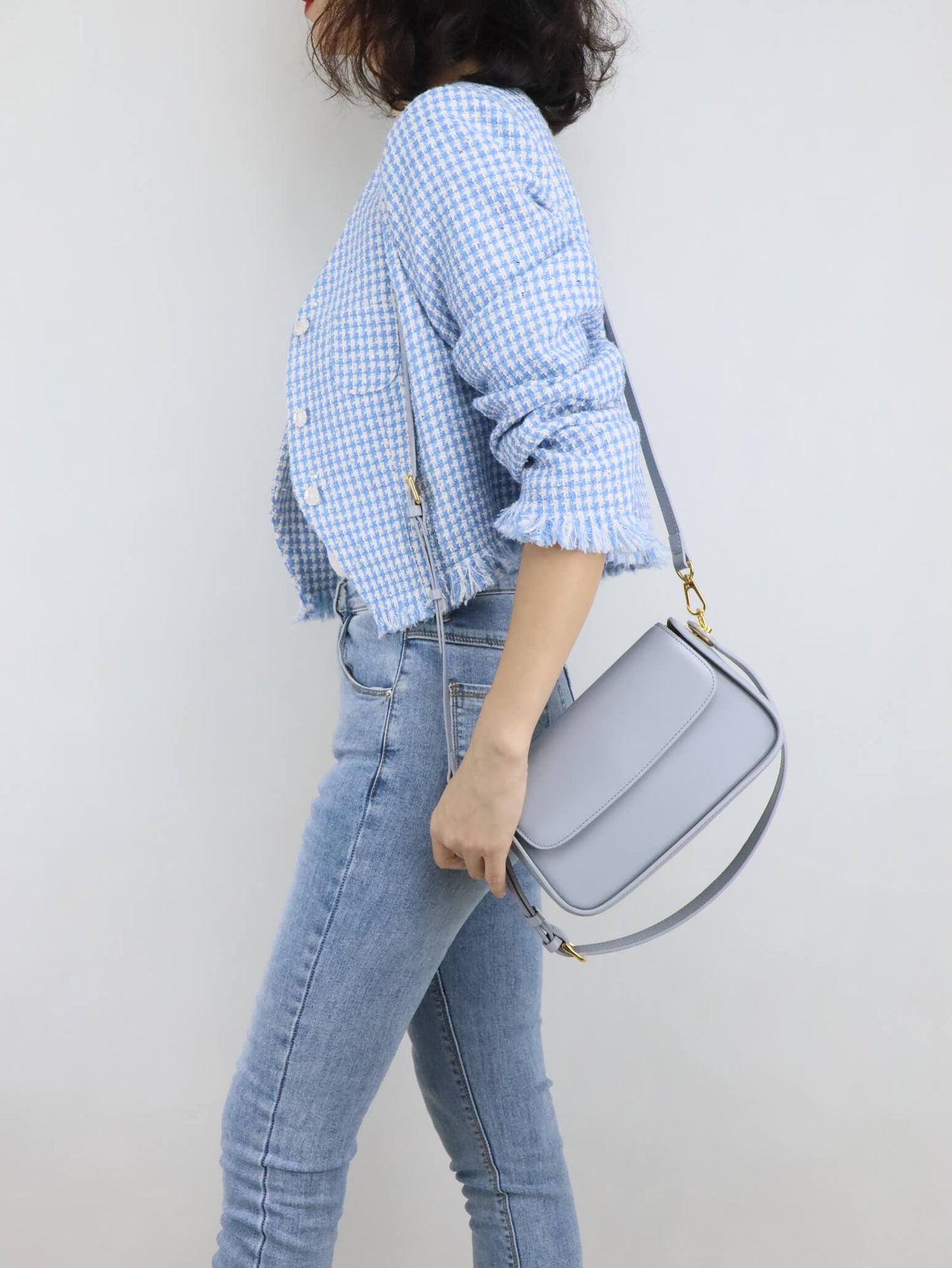 Blue Jacket with light grey leather crossbody bag