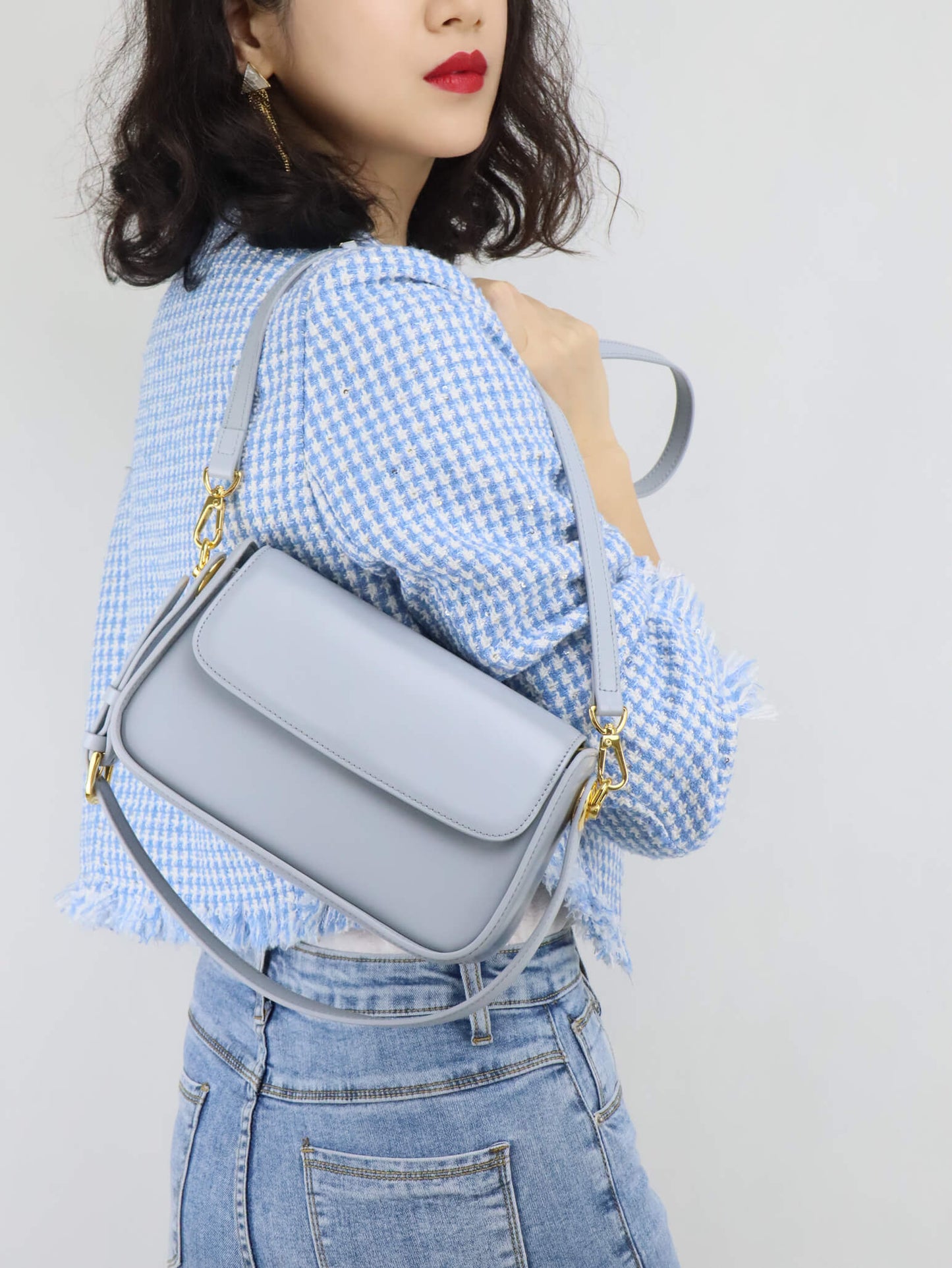 Blue Jacket with light grey leather crossbody bag